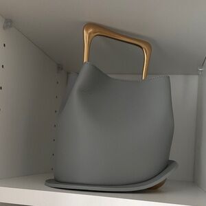 Elegant Gray Handbag with Gold Handle